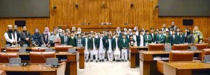 A group photograph of the students and faculty members from Dare-e-Arqam Schools, Abbottabad in the Senate hall at Parliament House