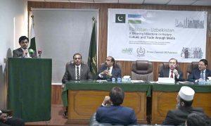Minister of State/Special Assistant to the Prime Minister on National Heritage and Culture, Huzaifa Rehman along with other dignitaries cutting cake during a Seminar on Pakistan-Uzbekistan: A growing Milestone in History Culture and Trade through Media at Press Council of Pakistan.