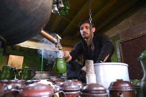 A worker prepares the famous Qehwa and tea at a shop in Qissa Khwani Bazaar, one of the oldest markets in South Asia, where traditional food shops, hotels, and Qehwa Khanas attract a large number of visitors
