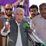 Federal Minister for Board of investment , Qaiser Ahmad Shaikh, talking to the media persons during his visit of visiting flood affected area.