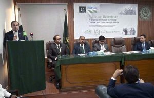 Minister of State/Special Assistant to the Prime Minister on National Heritage and Culture, Huzaifa Rehman along with other dignitaries cutting cake during a Seminar on Pakistan-Uzbekistan: A growing Milestone in History Culture and Trade through Media at Press Council of Pakistan.