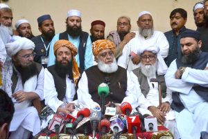 JUI-F Ameer Maulana Fazal Rehman addressing media persons in Muslim Colony.