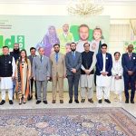 Prime Minister Muhammad Shehbaz Sharif in a group photo with the team of the Pakistan Polio Eradication Programme on the World Polio Day