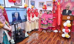Provincial Secretary for Culture and Tourism, Dr. Abdul Samad and China Window Administrator Amjad Aziz Malik along with other officials and students cutting ribbon during the inauguration ceremony of Mid-Autumn Festival celebration organized by China Window.