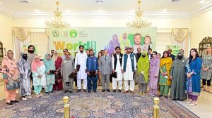 Prime Minister Muhammad Shehbaz Sharif in a group photo with polio workers of the Pakistan Polio Eradication Programme who were given awards at the World Polio Day Ceremony
