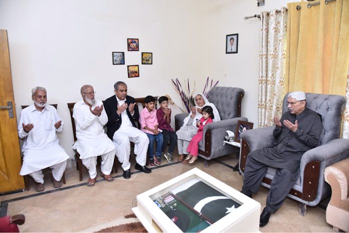 President Asif Ali Zardari offering condolences to the family of Lt. Colonel Junaid Shaheed, at their residence. Federal Minister for Interior and Narcotics Control, Mohsin Naqvi, is also present on the occasion