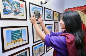 A visitor taking interest in on display books of china during the Mid-Autumn Festival celebration organized by China Window.