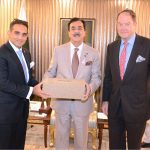 Chairman Senate Syed Yousaf Raza Gilani presenting souvenir to Lord Amir Sarfraz of Kensington (Member of the House of Lords) and General Patrick Sander at Parliament House