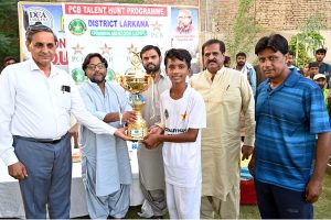 Players in action during the final cricket match between Government Municipal High School and Global Public School teams under the PCB Talent Hunt Program Inter-School Cricket Tournament Larkana Region 2025 at PCB Ground, Shaikh Zaid Colony