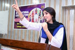 Students performing in a tableau during a function in connection with International Girl Child Day at Government Girls Degree College