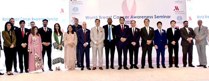 Chairman Senate, Syed Yousaf Raza Gilani in a group photo with participants of the World Breast Cancer & Mental Health Awareness Seminar