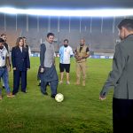 Governor Khyber Pakhtunkhwa, Faisal Karim Kundi, kicking a football to inaugurate the Dream Fest 2025 event at Jinnah Stadium, Sports Complex