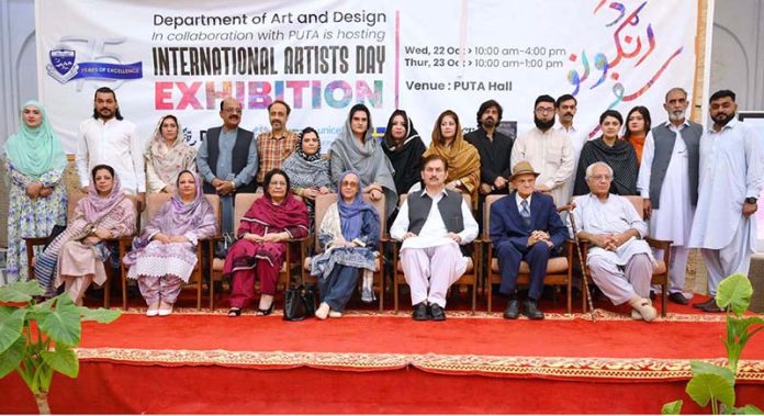 Chairperson Department of Fine Arts, UOP Ms. Tayaba in a group photo along with other officials during International Day of Artists organized by Department of Social Welfare, Merged Districts in collaboration with Department of Art & Design UOP with the support of UNICEF at Puta Hall