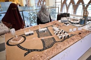 Visitor viewing Islamic calligraphy artwork during the 3rd Pakistan Hajj & Umrah Exhibition 2025 at Pak-China Friendship Centre