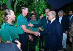 Prime Minister Muhammad Shehbaz Sharif interacts with the management and players of Pakistan Cricket team
