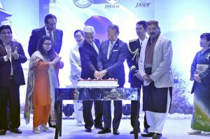 Khawaja Muhammad Asif, Federal Minister for Defense, H.E. Akamatsu Shuichi, Ambassador of Japan to Pakistan and Defense Attaché, Colonel ABE Kazuo cutting a cake to mark the 71st anniversary of Japan Self-Defense Forces (JSDF) Day.