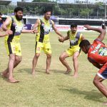 Kabaddi players in action during the match between Khyber Pakhtunkhwa and Sindh teams at Punjab Stadium.