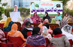 A women reciting Naat during the Seerat ul Nabi Conference at the Gomi Bai Ladies Club