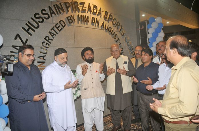 Federal Minister for Housing and Works, Riaz Hussain Pirzada offering dua with others during the inauguration ceremony of the Riaz Hussain Pirzada Sports Complex at the Royal Institute of Medical Sciences