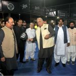 Federal Minister for Housing and Works, Riaz Hussain Pirzada playing a padel game during his visit to the Royal Institute of Medical Sciences after inaugurating the Riaz Hussain Pirzada Sports Complex