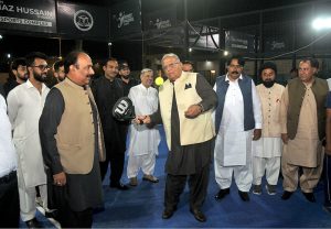 Federal Minister for Housing and Works, Riaz Hussain Pirzada playing a padel game during his visit to the Royal Institute of Medical Sciences after inaugurating the Riaz Hussain Pirzada Sports Complex