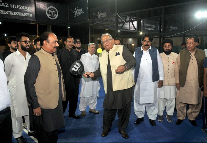 Federal Minister for Housing and Works, Riaz Hussain Pirzada playing a padel game during his visit to the Royal Institute of Medical Sciences after inaugurating the Riaz Hussain Pirzada Sports Complex