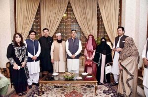Acting President Syed Yousuf Raza Gilani in a group photo with opposition members of Khyber Pakhtunkhwa Assembly at the Governor House.