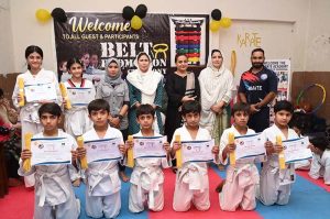 Marshal art young student demonstrate her skills during the Karate Academy Belt Promotion ceremony at the University of Sargodha.