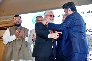 Governor Sindh Kamran Khan Tessori presenting Gold medal to Famous Businessman Zubair Motiwala during the awards ceremony of the Rice Exporters Association of Pakistan (REAP) at local hotel