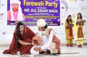 Students of Govt Girls Little Folks Higher Secondary School performing in a tableau during Farewell Party in Honour Ex-District Education Officer (ES&HS) Gul Bahar Magsi at Begum Nusrat Bhutto Hall Jinnah Bagh