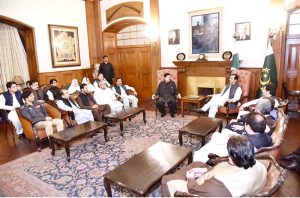 Acting President Syed Yousuf Raza Gilani in a meeting with former PPPP MNAs and MPAs at the Governor House.
