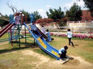 Children have been enjoying at a park on a cold day as city received rain.