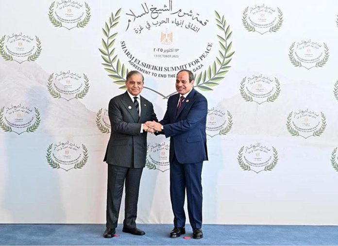 Egyptian President Abdel Fattah El-Sisi receiving Prime Minister Muhammad Shehbaz Sharif upon his arrival to attend Sharm El Sheikh Peace Summit