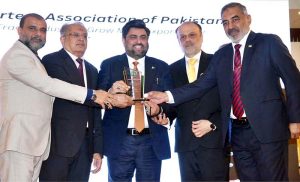 Governor Sindh Kamran Khan Tessori receives shield from REAP Leaders during the awards ceremony of the Rice Exporters Association of Pakistan (REAP) at local hotel