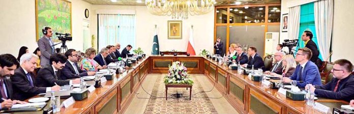 Deputy Prime Minister and Foreign Minister Senator Mohammad Ishaq Dar in a delegation-level talks with his Polish counterpart Radoslaw Sikorski at the Ministry of Foreign Affairs
