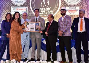 A souvenir is being presented to Chairman Senate, Syed Yousaf Raza Gilani by the organizer of the award distribution ceremony 16th edition of "Brand of the year awards 2025"