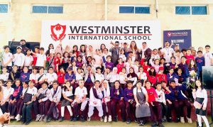 Barrister Danyal Chaudhry,Parliamentary Secretary for Information & Broadcasting, with school leadership and young participants at the successful launch of the Youngpreneurs Initiative at Westminster International School