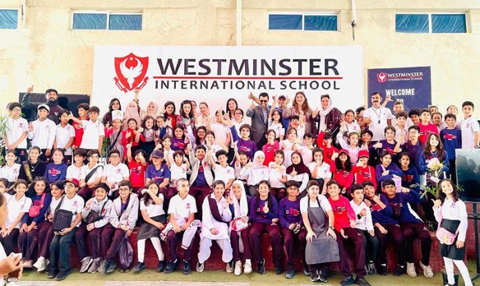 Barrister Danyal Chaudhry,Parliamentary Secretary for Information & Broadcasting, with school leadership and young participants at the successful launch of the Youngpreneurs Initiative at Westminster International School
