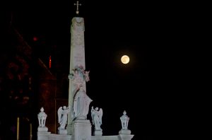 The Supper Moon rises from behind the St. Patrick’s Cathedral.