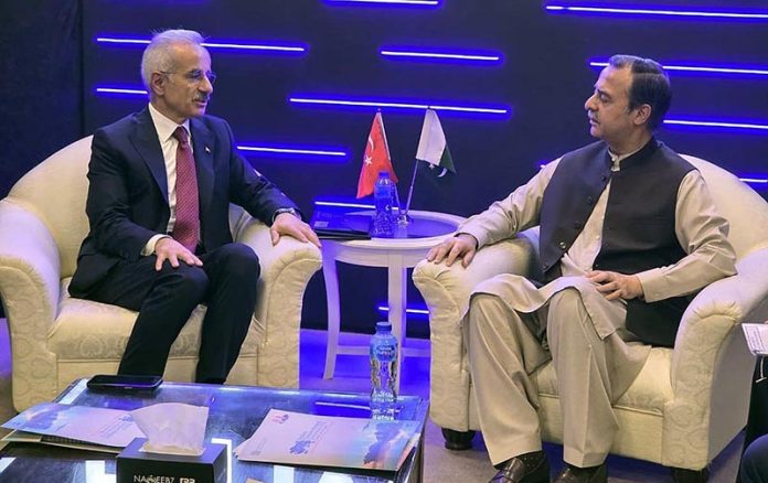 Federal Minister for Maritime Affairs Muhammad Junaid Anwar Chaudhry talking to Türkiye's Minister of Transport and Infrastructure Abdulkadir Uraloğlu who called on him