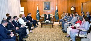 President Asif Ali Zardari talking to Mr Radosław Sikorski, Deputy Prime Minister and Minister of Foreign Affairs of Poland, at Aiwan-e-Sadr