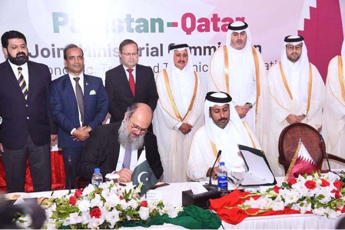 Federal Minister for Commerce, Jam Kamal Khan, and Sheikh Faisal bin Thani bin Faisal Al Thani, Minister of Commerce and Industry of the State of Qatar, sign the Protocol of the 6th Pakistan-Qatar Joint Ministerial Commission