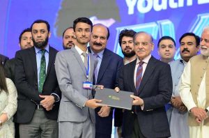 Prime Minister Muhammad Shehbaz Sharif awards laptops to high achieving students at the launching ceremony of Prime Minister's Youth Laptop Scheme 2025.