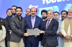 Prime Minister Muhammad Shehbaz Sharif awards laptops to high achieving students at the launching ceremony of Prime Minister's Youth Laptop Scheme 2025.