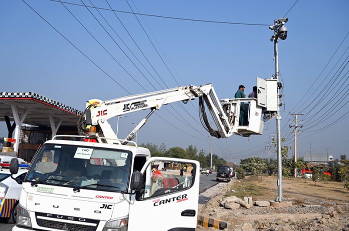 Workers busy repairing CCTV cameras near Pendora stop in the Federal Caapital