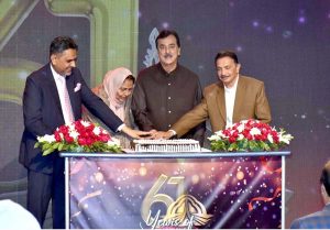 Chairman Senate Syed Yusuf Raza Gilani is cutting the cake on the 61st anniversary of Pakistan Television.