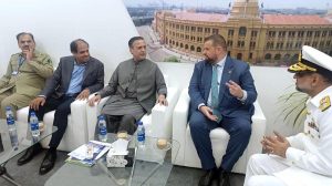 Federal Minister for Maritime Affairs , Muhammad Junaid Chaudhry talking to Ambassador of Romania who called on him