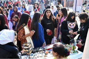 A vendor preparing tradition sajji to attract customers during the ten-day annual folk festival “Lok Mela 2025” at Lok Virsa.