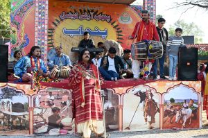 Entrepreneurs selling traditional food at a stall at Ten-Day annual folk festival “Lok Mela 2025” at Lok Virsa