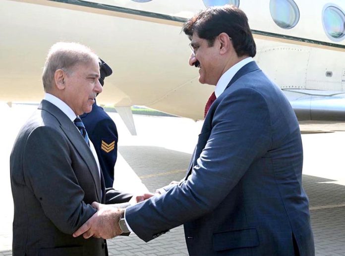 Chief Minister Sindh Syed Murad Ali Shah receiving Prime Minister Muhammad Shehbaz Sharif upon his arrival